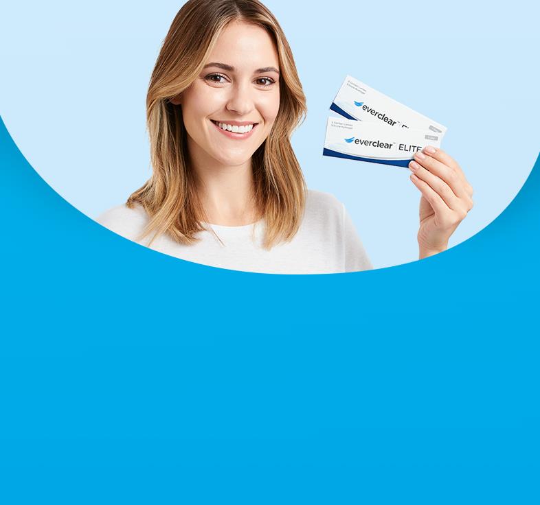 Two boxes of everclear ELITE contact lenses on a blue background
