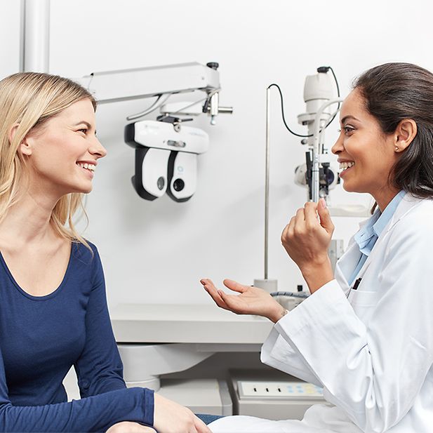 Optometrist consults patient